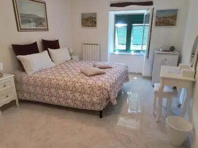 Letto o letti in una camera di ANITA B&B