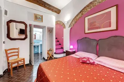 Letto o letti in una camera di Vecchio Mulino Rosa