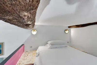Letto o letti in una camera di Vecchio Mulino Rosa