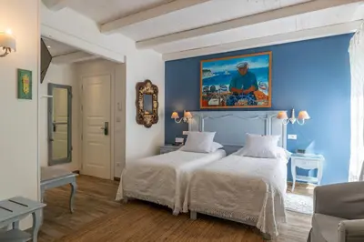 Letto o letti in una camera di Villa Valentina