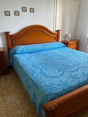 Letto o letti in una camera di Bilocale Mirella