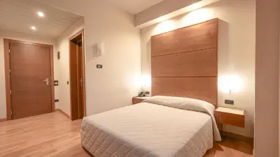 Letto o letti in una camera di Hotel Europa