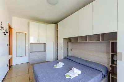 Letto o letti in una camera di JOIVY Kiki House