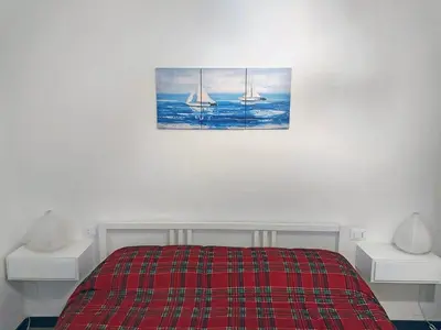 Letto o letti in una camera di CASA ACCIUGHINA