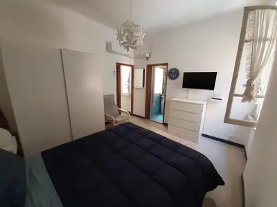 Letto o letti in una camera di CASA ACCIUGHINA