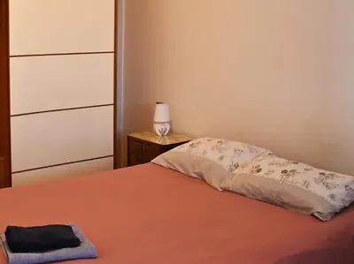 Letto o letti in una camera di A casa di Annamaria
