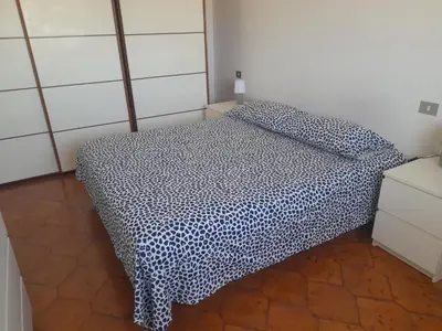 Letto o letti in una camera di A casa di Annamaria