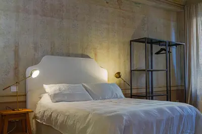 Letto o letti in una camera di Palazzo Glori 6
