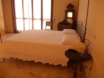 Letto o letti in una camera di Villa Costanza