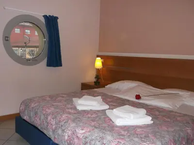 Letto o letti in una camera di Albergo Meublè Abatjour