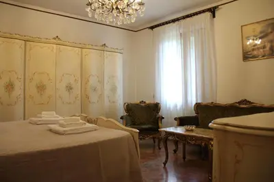 Letto o letti in una camera di Villa Veralda, la magia di una Toscana insolita