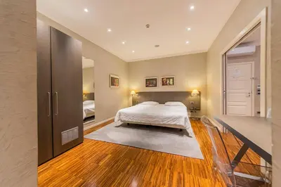 Letto o letti in una camera di Century Hotel