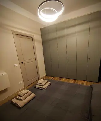 Letto o letti in una camera di casa in oltretorrente Parma