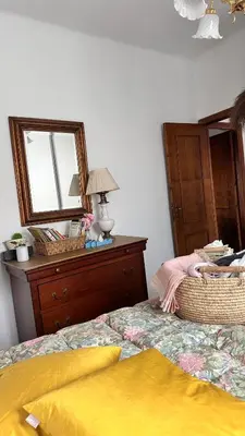 Letto o letti in una camera di GolfoParadiso Uscio bombon - PellicceriaSuperior