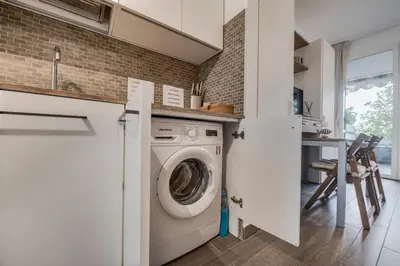 Cucina o angolo cottura di 070 - Villa OLANDA con veranda VISTA MARE a 5 minuti SPIAGGIA con PISCINA CONDOMINIALE
