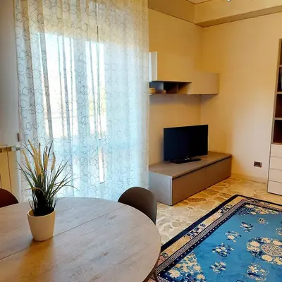 TV o dispositivi per l'intrattenimento presso Attico Guest House