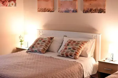 Letto o letti in una camera di Affitti turistici: OASI FELICE