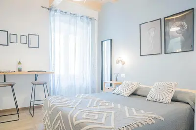 Letto o letti in una camera di Moneglia in Piazza