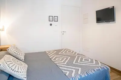 Letto o letti in una camera di Moneglia in Piazza