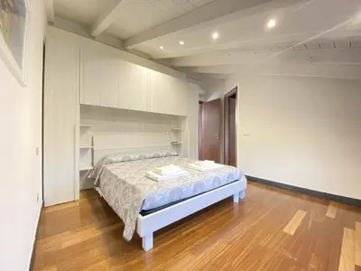 Letto o letti in una camera di Casa Alda