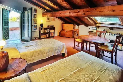 Letto o letti in una camera di B&B Due Fiumi 1908