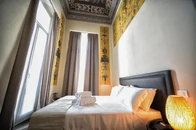Letto o letti in una camera di Hotel Palazzo Vannoni