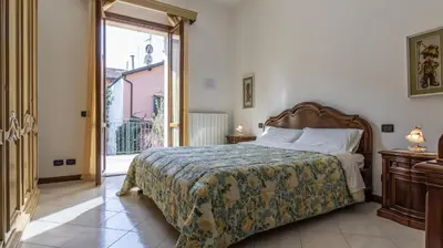Letto o letti in una camera di Francesca Apartment in Sassuolo - Affitti Brevi Italia