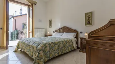 Letto o letti in una camera di Francesca Apartment in Sassuolo - Affitti Brevi Italia