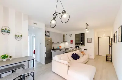 Cucina o angolo cottura di JOIVY Flat with Terrace & Parking
