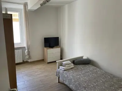 Letto o letti in una camera di Al Battistero