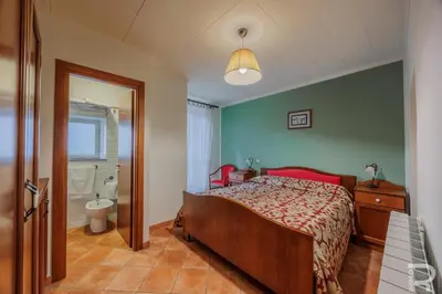 Letto o letti in una camera di Albergo Miramonti