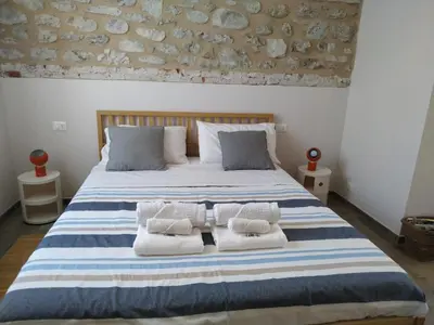 Letto o letti in una camera di Il Giardino di Marzo Guest House