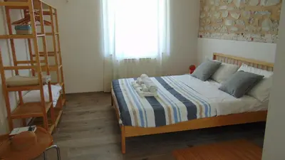 Letto o letti in una camera di Il Giardino di Marzo Guest House