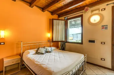 Letto o letti in una camera di Agriturismo Pozzo Fiorito