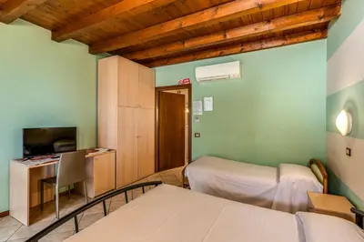Letto o letti in una camera di Agriturismo Pozzo Fiorito