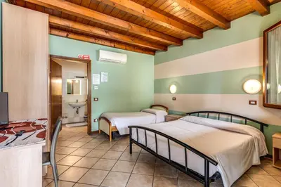 Letto o letti in una camera di Agriturismo Pozzo Fiorito