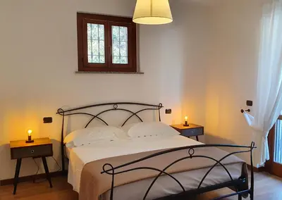 Letto o letti in una camera di B&B LE TERME