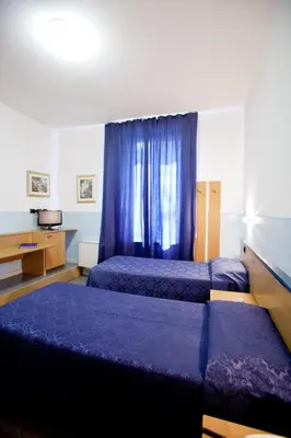 Letto o letti in una camera di Master Hotel