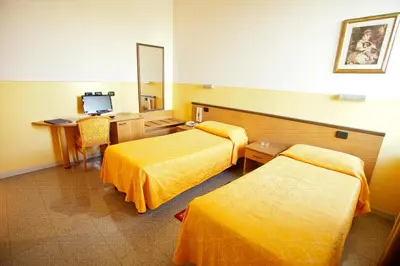 Letto o letti in una camera di Master Hotel