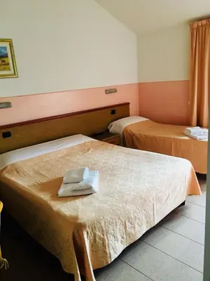 Letto o letti in una camera di Master Hotel