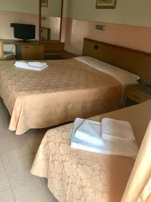 Letto o letti in una camera di Master Hotel