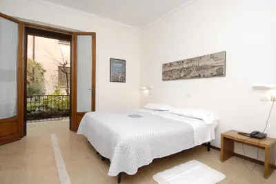 Letto o letti in una camera di Albergo Bianchi Stazione