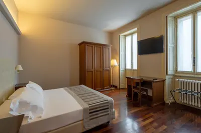 Letto o letti in una camera di Hotel Antica Dimora, MantegnaHotels