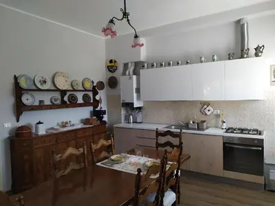 Cucina o angolo cottura di Casa Vacanze I Giardini di Marzo