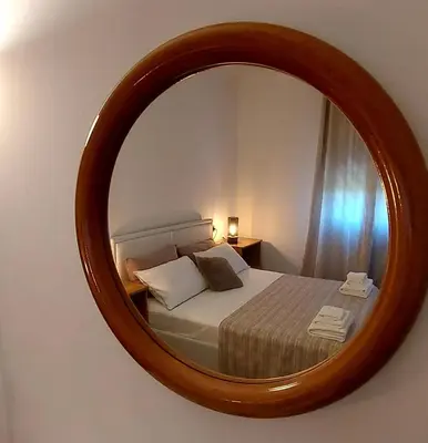 Letto o letti in una camera di Il sole