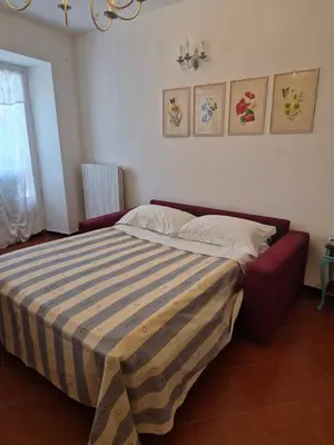 Letto o letti in una camera di Il Borgo di Ra