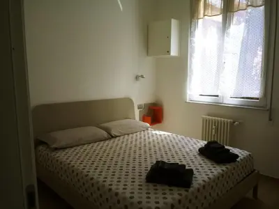 Letto o letti in una camera di Casa Artemisia