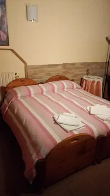 Letto o letti in una camera di B&B La Verna