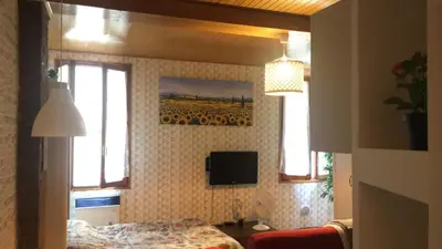 TV o dispositivi per l'intrattenimento presso Guest House Benny