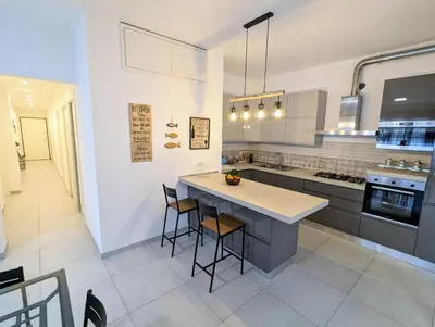 Cucina o angolo cottura di Profumo di Mare - Appartamento ristrutturato a 50 m dal mare